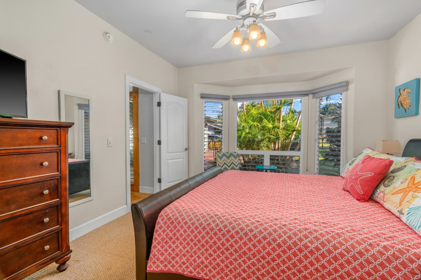 Downstairs primary bedroom with king bed